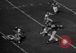 Immagine di Football americano Los Angeles California USA, 1957, secondo 38 filmato di repertorio 65675055746