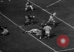 Immagine di Football americano Los Angeles California USA, 1957, secondo 39 filmato di repertorio 65675055746