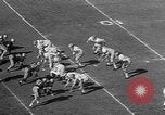 Immagine di Football americano Los Angeles California USA, 1957, secondo 46 filmato di repertorio 65675055746