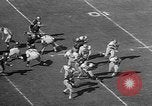 Immagine di Football americano Los Angeles California USA, 1957, secondo 47 filmato di repertorio 65675055746