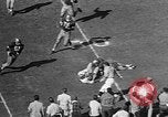 Immagine di Football americano Los Angeles California USA, 1957, secondo 53 filmato di repertorio 65675055746