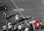 Immagine di Football americano Los Angeles California USA, 1957, secondo 54 filmato di repertorio 65675055746