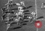 Immagine di Football americano Los Angeles California USA, 1957, secondo 55 filmato di repertorio 65675055746