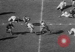 Immagine di Football americano Los Angeles California USA, 1957, secondo 57 filmato di repertorio 65675055746