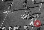 Immagine di Football americano Los Angeles California USA, 1957, secondo 60 filmato di repertorio 65675055746