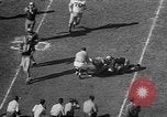 Immagine di Football americano Los Angeles California USA, 1957, secondo 61 filmato di repertorio 65675055746
