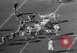 Immagine di Football americano Los Angeles California USA, 1957, secondo 62 filmato di repertorio 65675055746