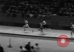 Standbild Indoor-strecke Leichtathletik New York United States USA, 1959, aus Sekunde 32 historischem Filmmaterial Videoclip 65675055766