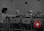 Image of quadruplets in cots Holland Netherlands, 1959, second 9 stock footage video 65675055806