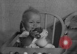 Image of quadruplets in cots Holland Netherlands, 1959, second 16 stock footage video 65675055806