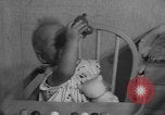 Image of quadruplets in cots Holland Netherlands, 1959, second 17 stock footage video 65675055806