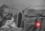 Image of quadruplets in cots Holland Netherlands, 1959, second 19 stock footage video 65675055806