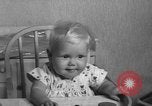 Image of quadruplets in cots Holland Netherlands, 1959, second 21 stock footage video 65675055806