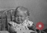 Image of quadruplets in cots Holland Netherlands, 1959, second 22 stock footage video 65675055806
