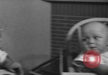 Image of quadruplets in cots Holland Netherlands, 1959, second 23 stock footage video 65675055806