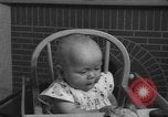 Image of quadruplets in cots Holland Netherlands, 1959, second 25 stock footage video 65675055806