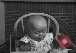Image of quadruplets in cots Holland Netherlands, 1959, second 26 stock footage video 65675055806