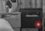 Image of quadruplets in cots Holland Netherlands, 1959, second 28 stock footage video 65675055806