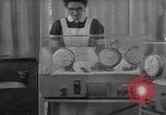 Image of quadruplets in cots Holland Netherlands, 1959, second 32 stock footage video 65675055806