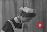Image of quadruplets in cots Holland Netherlands, 1959, second 39 stock footage video 65675055806