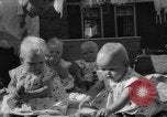 Image of quadruplets in cots Holland Netherlands, 1959, second 50 stock footage video 65675055806