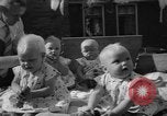 Image of quadruplets in cots Holland Netherlands, 1959, second 51 stock footage video 65675055806