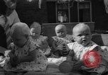 Image of quadruplets in cots Holland Netherlands, 1959, second 52 stock footage video 65675055806
