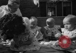 Image of quadruplets in cots Holland Netherlands, 1959, second 54 stock footage video 65675055806