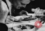 Image of eating bulbs Berlin Germany, 1962, second 32 stock footage video 65675055858