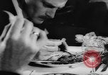 Image of eating bulbs Berlin Germany, 1962, second 34 stock footage video 65675055858