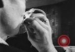 Image of eating bulbs Berlin Germany, 1962, second 56 stock footage video 65675055858
