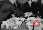 Image of over two million dollars discovered in car Jersey City New Jersey USA, 1962, second 31 stock footage video 65675055863