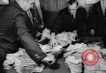 Image of over two million dollars discovered in car Jersey City New Jersey USA, 1962, second 33 stock footage video 65675055863
