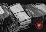 Image of over two million dollars discovered in car Jersey City New Jersey USA, 1962, second 37 stock footage video 65675055863
