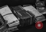 Image of over two million dollars discovered in car Jersey City New Jersey USA, 1962, second 38 stock footage video 65675055863