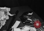 Image of over two million dollars discovered in car Jersey City New Jersey USA, 1962, second 41 stock footage video 65675055863