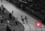 Immagine di Pista coperta campo e soddisfare California United States USA, 1962, secondo 54 filmato di repertorio 65675055885