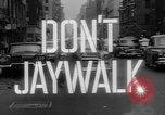 Image of accidents due to jaywalking United States USA, 1961, second 28 stock footage video 65675055897
