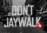 Image of accidents due to jaywalking United States USA, 1961, second 51 stock footage video 65675055897