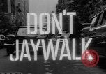 Image of accidents due to jaywalking United States USA, 1961, second 52 stock footage video 65675055897