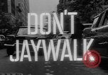 Image of accidents due to jaywalking United States USA, 1961, second 53 stock footage video 65675055897