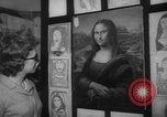 Immagine di Mona Lisa dipinti New York City USA, 1963, secondo 15 filmato di repertorio 65675055908