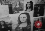 Immagine di Mona Lisa dipinti New York City USA, 1963, secondo 23 filmato di repertorio 65675055908