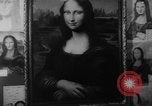 Immagine di Mona Lisa dipinti New York City USA, 1963, secondo 29 filmato di repertorio 65675055908