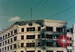 Image of U.S. sailors in Japanese city downtown Nagasaki Japan, 1945, second 3 stock footage video 65675055940
