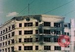 Image of U.S. sailors in Japanese city downtown Nagasaki Japan, 1945, second 4 stock footage video 65675055940