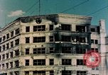 Image of U.S. sailors in Japanese city downtown Nagasaki Japan, 1945, second 5 stock footage video 65675055940