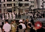 Image of U.S. sailors in Japanese city downtown Nagasaki Japan, 1945, second 13 stock footage video 65675055940