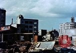 Image of U.S. sailors in Japanese city downtown Nagasaki Japan, 1945, second 27 stock footage video 65675055940