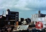 Image of U.S. sailors in Japanese city downtown Nagasaki Japan, 1945, second 28 stock footage video 65675055940